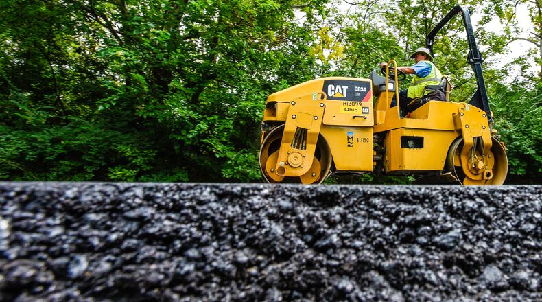 Middletown City Council members approved a $31 million contract to a Cincinnati-based paving company to repair about 127 lane miles in the city. NICK GRAHAM/STAFF