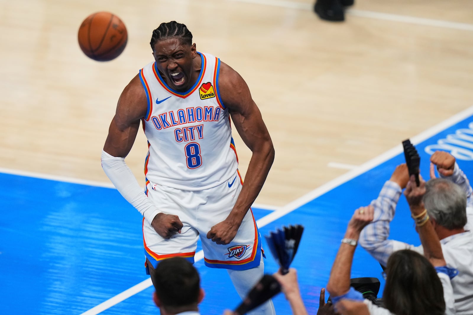 Oklahoma City Thunder forward Jalen Williams (8) celebrates after a dunk during the second half of Game 1 of the NBA Finals basketball series against the Indiana Pacers Thursday, June 5, 2025, in Oklahoma City. (AP Photo/Nate Billings)