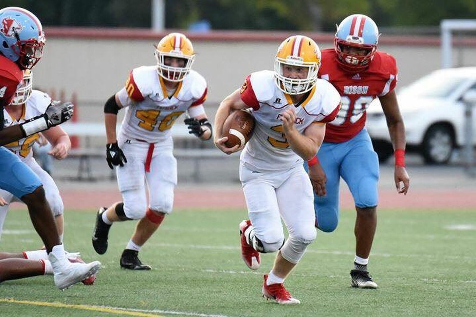 Fenwick’s Jack Fessler (3) looks for running room during last Friday’s 30-16 triumph over Belmont at Welcome Stadium in Dayton. CONTRIBUTED PHOTO BY ANGIE MOHRHAUS