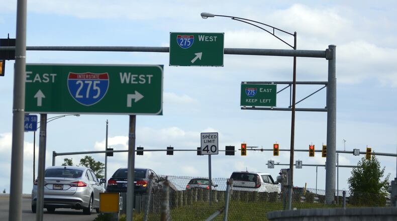 Commuters head south on Winton Road toward the westbound Interstate 275 on-ramp in Forest Park in 2017. Traffic normally backs up a half mile north of the interstate interchange. MICHAEL D. PITMAN/STAFF