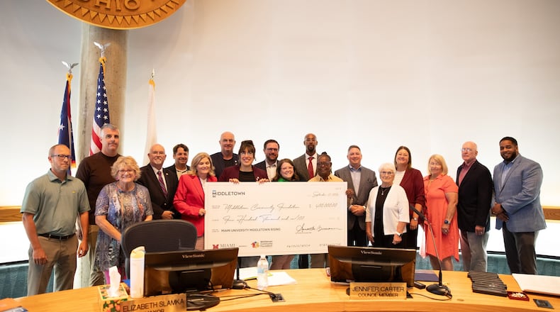 Middletown's new partnership with Miami University and the city's public and private schools will mean more students will attend college locally thanks to $400,000 in donated scholarship funds. The new program was unveiled at a recent Middletown City Council meeting. (Provided/Journal-News)