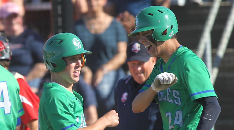 Chaminade Julienne’s Dylan Snyder, left, and Sebastian Gongora celebrate after scoring against Bishop Hartley in a Division II regional semifinal on Thursday, May 24, 2018, at Mason High School. David Jablonski/Staff
