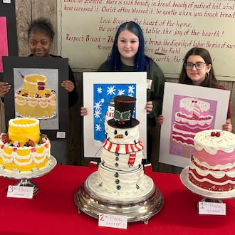 Three seventh-graders from Middletown Middle School were recognized for finishing in the Top 3 in a painting contest at Central Pastry Shop. From left: London Green (third), Gracie Drew (second) and Nora Orick (first) with their paintings and cakes. RICK McCRABB/CONTRIBUTOR