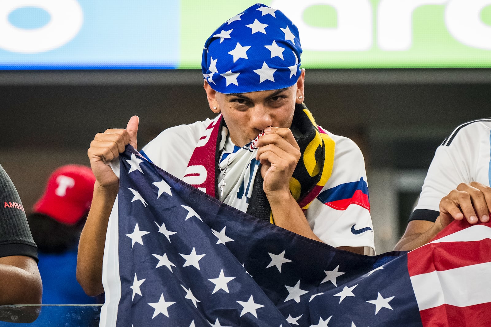 A United States fan celebrates a goal during a CONCACAF Gold Cup soccer match against Haiti Sunday, June 22, 2025, in Arlington, Texas. (AP Photo/Jessica Tobias)