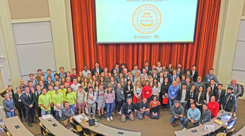 For the first time in its history the widely acclaimed entrepreneurial program at Miami University’s business school has won a top, international ranking among both public and private schools. Miami officials said this week the school’s Farmer School’s John W. Altman Institute for Entrepreneurship has “reached new heights in the latest undergraduate entrepreneurship program rankings by Princeton Review, coming in at No. 9 in the world and No. 5 among public colleges and universities.” Pictured are participants in October's Startup Weekend at Miami, one of the bigger entrepreneurship events of the semester. (Provided Photo\Journal-News)