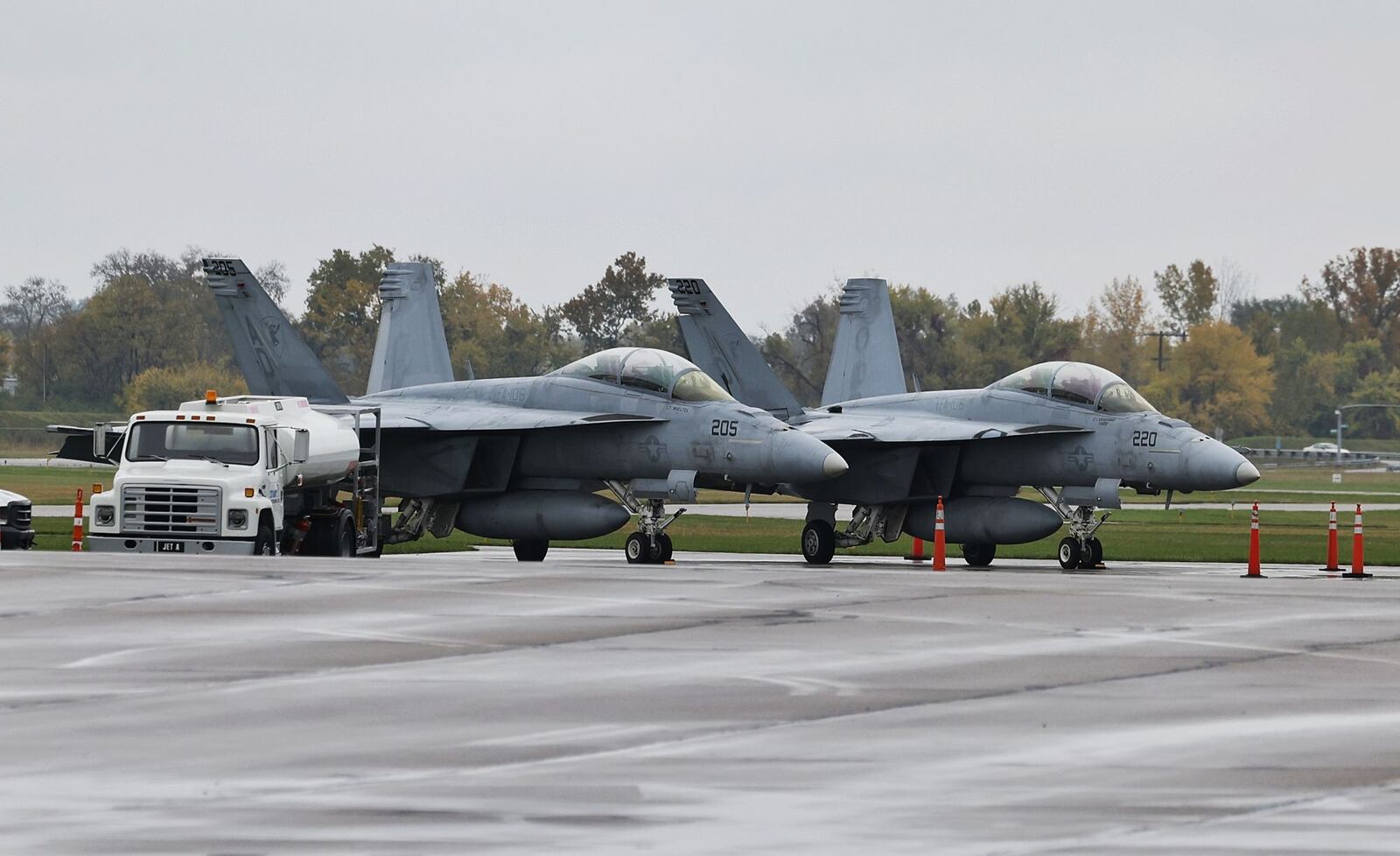 Two military planes stopped at the Middletown Regional Airport to get fuel on Friday. The pilots will be performing a flyover at Miami University's football game on Saturday, Oct. 21.