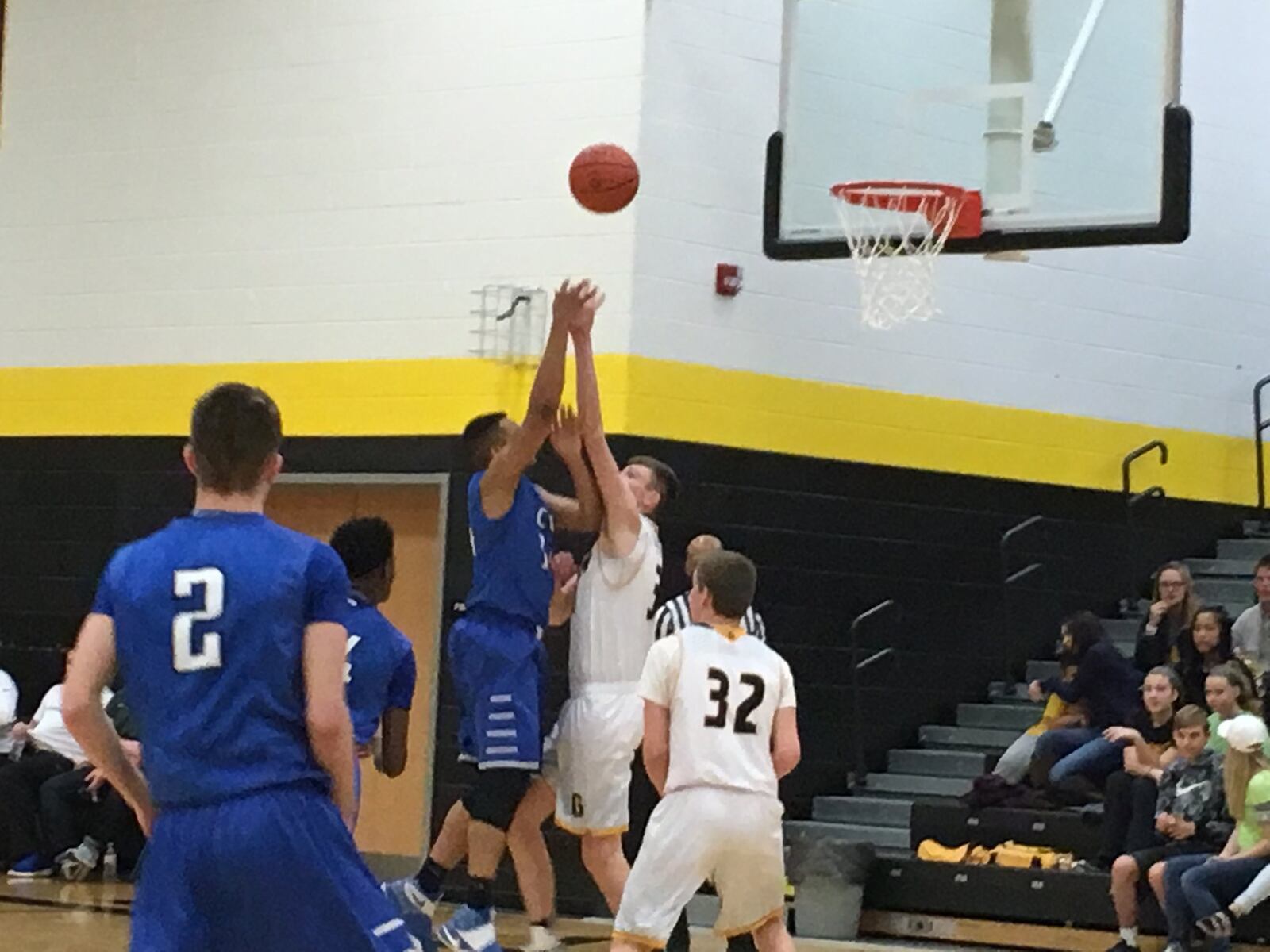 Cincinnati Christian’s Christian Keese (14) puts up a shot over Georgetown’s Noah Pack on Saturday night during a Division IV sectional final at Taylor. That’s Josh Oates (2) of CCS and Tanner Ellis (32) of the G-Men watching the shot. RICK CASSANO/STAFF