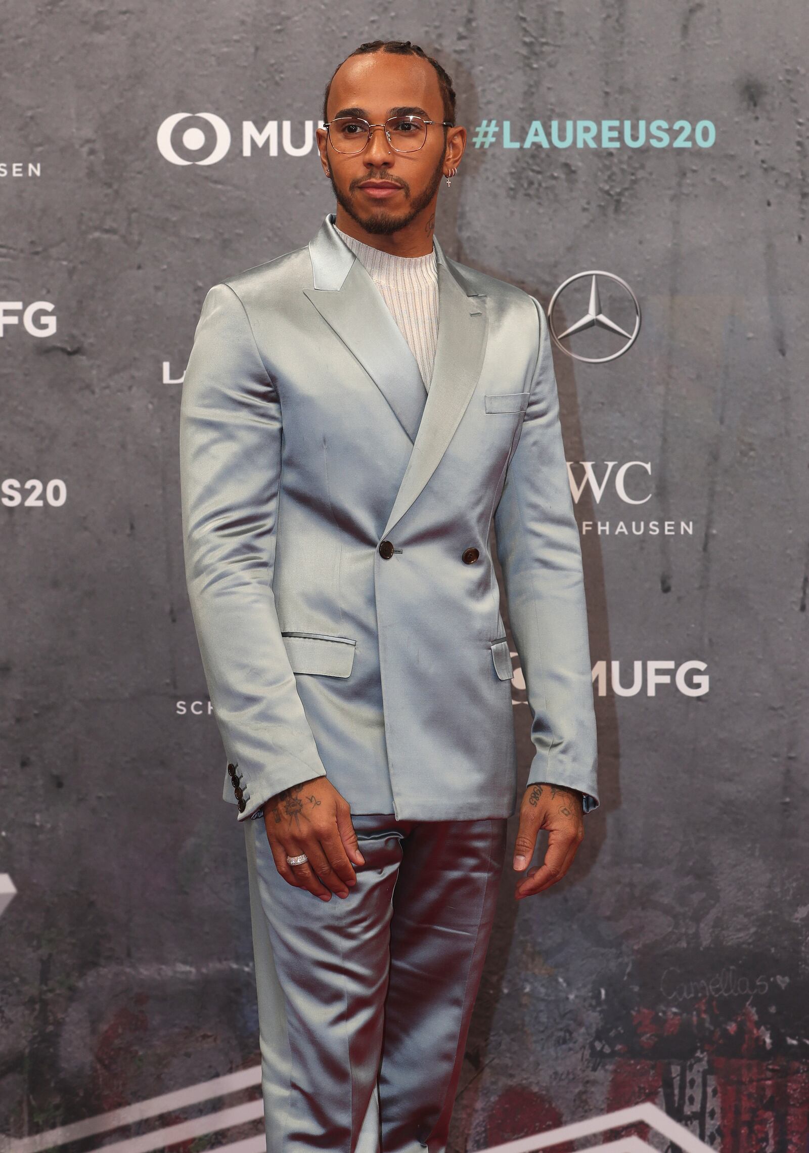 FILE - British reigning F1 drivers champion Lewis Hamilton arrives for the 2020 Laureus World Sports Awards in Berlin, Germany, Monday, Feb. 17, 2020. (AP Photo/Michael Sohn, File)