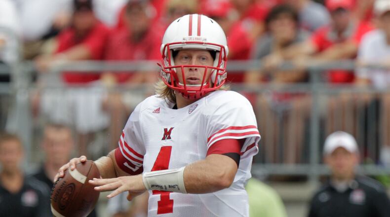 Miami of Ohio's Zac Dysert drops back to pass against Ohio State during the first quarter of an NCAA college football game Saturday, Sept. 1, 2012, in Columbus, Ohio.