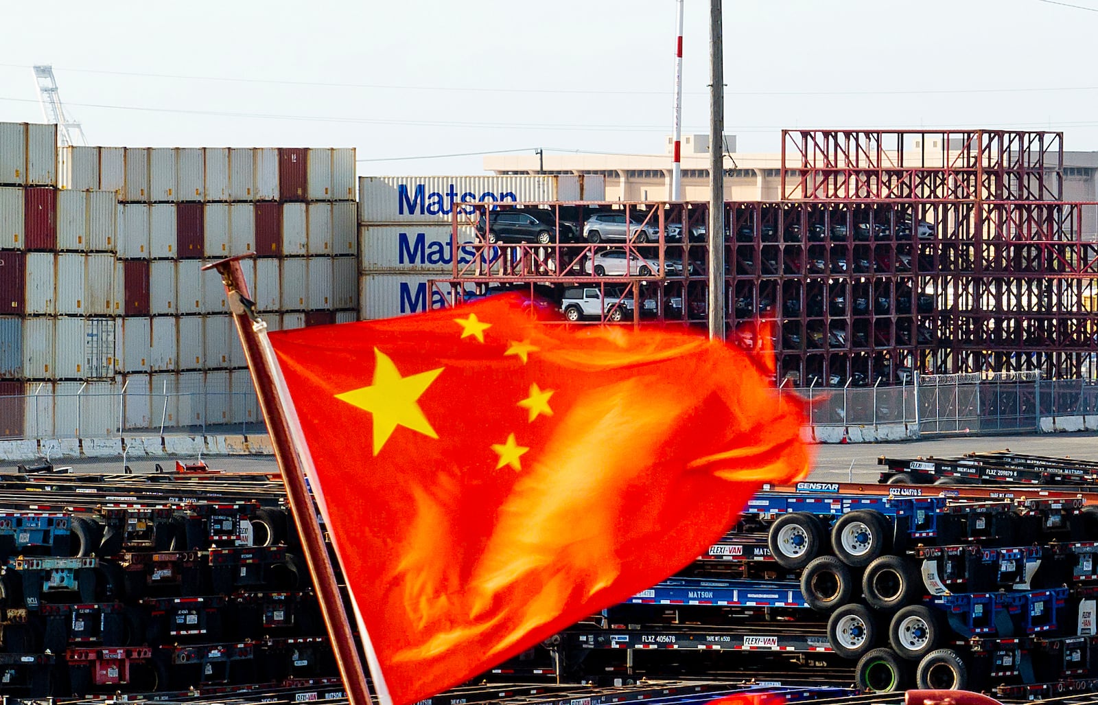 FILE - A Chinese flag flies from a ship at the Port of Oakland on Tuesday, April 15, 2025, in Oakland, Calif. (AP Photo/Noah Berger,File)