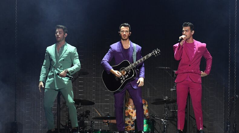 NEW YORK, NEW YORK - AUGUST 29: (L-R) Nick Jonas, Kevin Jonas, and Joe Jonas of The Jonas Brothers perform in concert at Madison Square Garden on August 29, 2019 in New York City. (Photo by Dimitrios Kambouris/Getty Images)