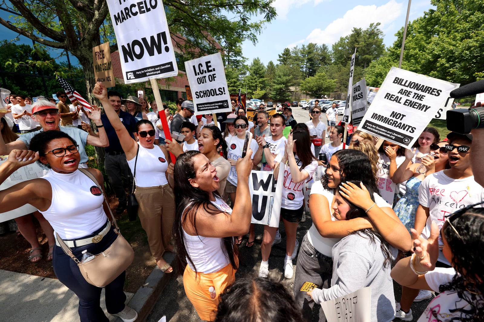 Supporters gather outside federal court in support of Marcelo Gomes da Silva, who was arrested on his way to volleyball practice last weekend, on Thursday, June 5, 2025 in Milford, Mass.(AP Photo/Mark Stockwell)