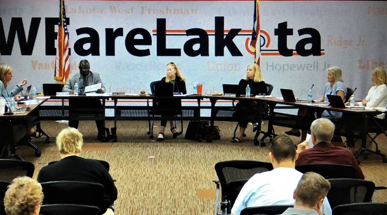During a rare mid-day work session meeting of the Lakota Board of Education Thursday, members heard the five-year budget forecast from Treasurer Jenni Logan. Logan told the board the 17,000-student school system will begin operating in a budget deficit in 2024, according to her projections. (Photo By Michael D. Clark\Journal-News)