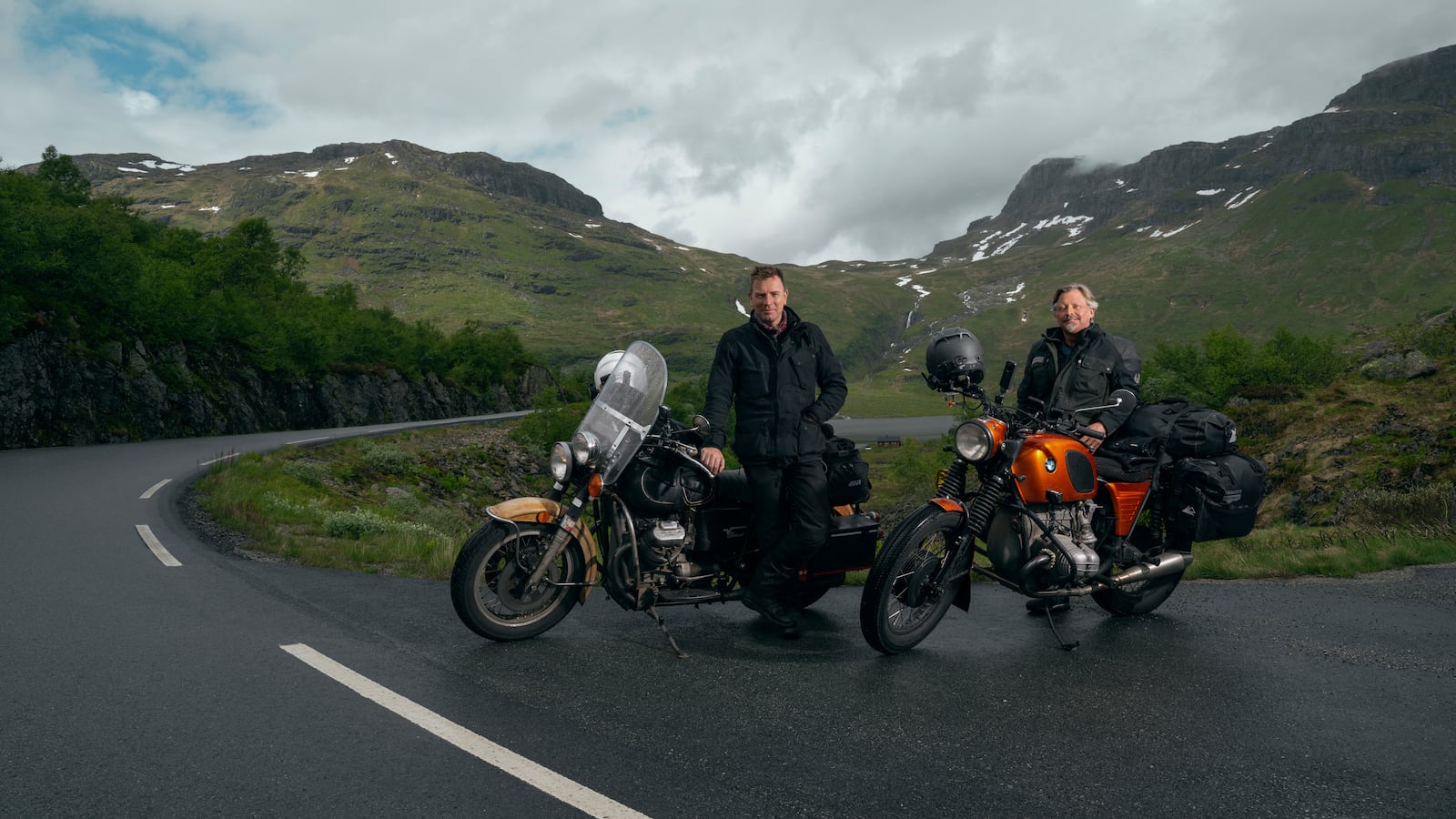 This image released by Apple TV+ shows Ewan McGregor, left, and Charley Boorman in a scene from "Long Way Home." (Ian Gavan/Apple TV+ via AP)