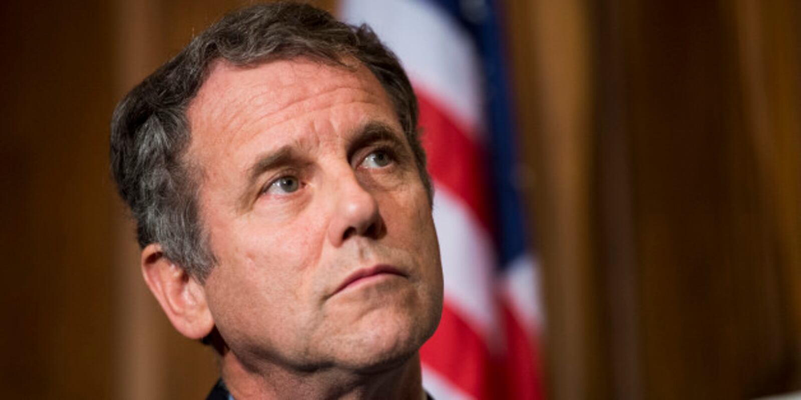  UNITED STATES - OCTOBER 9: Sen. Sherrod Brown, D-Ohio, listens as the Senate Veterans' Affairs Committee Democrats hold a news conference to highlight the impacts of the government shutdown on veterans on Wednesday, Oct. 9, 2013. (Photo By Bill Clark/CQ Roll Call)