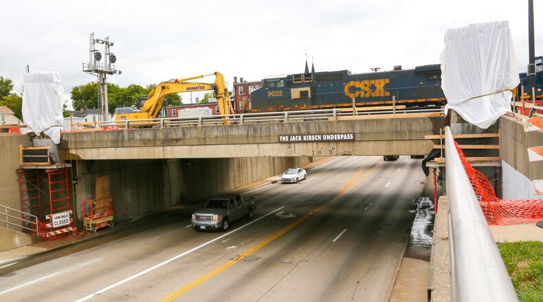 Crews hired by ODOT are putting up a new fence at the Jack Kirsch Overpass in Hamilton that will feature an image of Billy Yank, the guy atop the Soldiers, Sailors and Pioneers monument a few blocks to the west, along with the date, 1791. GREG LYNCH / STAFF