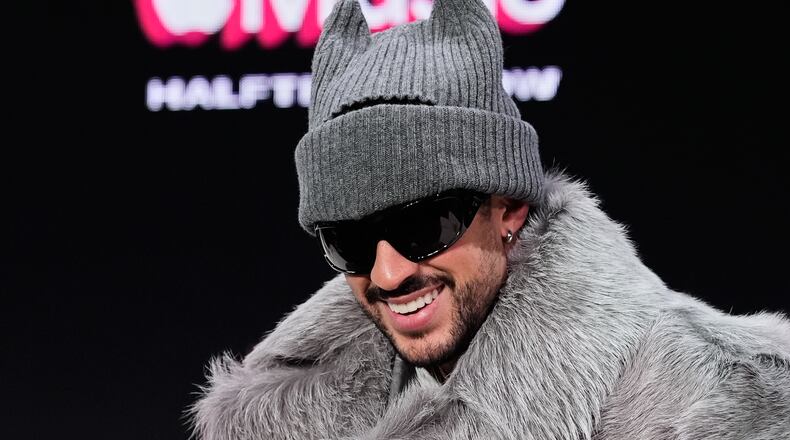 Apple Music Super Bowl LX Halftime Show performer Bad Bunny smiles during a news conference, Thursday, Feb. 5, 2026, in San Francisco ahead of the NFL Super Bowl 60 football game between the Seattle Seahawks and the New England Patriots. (AP Photo/Godofredo A. Vásquez)