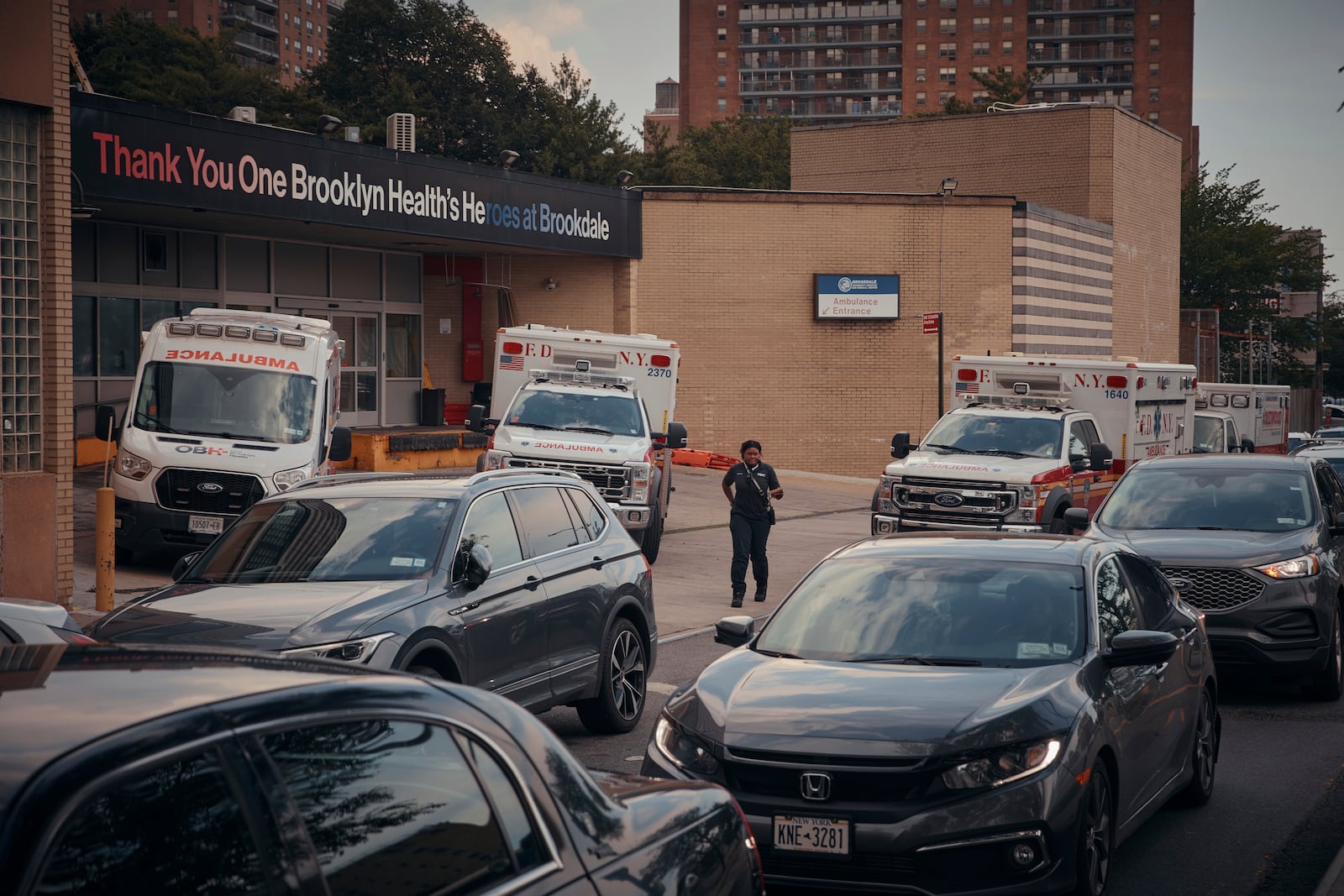 Ambulances are parked outside Brookdale University Hospital and Medical Center on Tuesday, July 1, 2025, in the Brooklyn borough of New York. (AP Photo/Andres Kudacki)