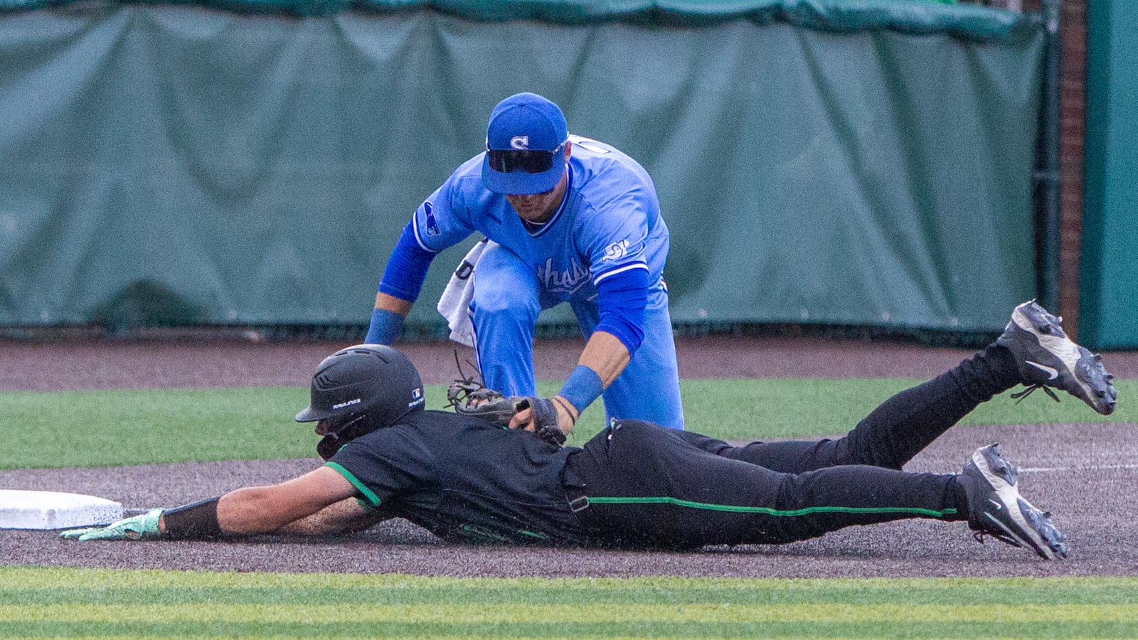 Springboro third baseman Ben Veletean tags out Mason's Sam Davies on a throw from right fielder Adam Smith during Thursday's Division I regional final. Davies was trying to advance after a flyout. Jeff Gilbert/CONTRIBUTED