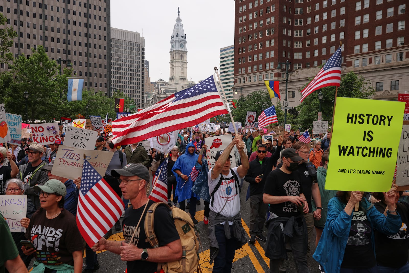 Demonstrators march during the "No Kings" protest, Saturday, June 14, 2025, in Philadelphia. (AP Photo/Yuki Iwamura)