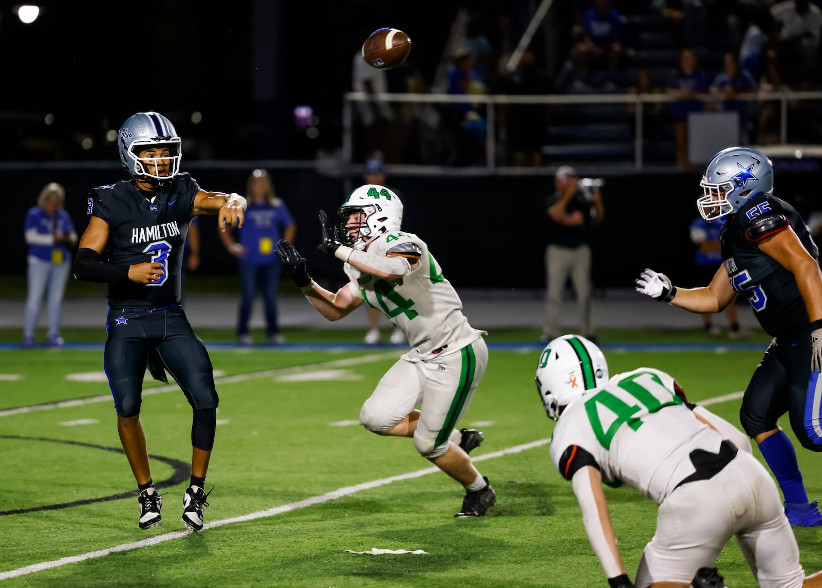 Hamilton's Jayden McClain passes the ball on week one of high school football against Badin Friday, Aug. 22, 2025 at Virgil M. Schwarm Stadium in Hamilton. Badin won 38-20. NICK GRAHAM/STAFF