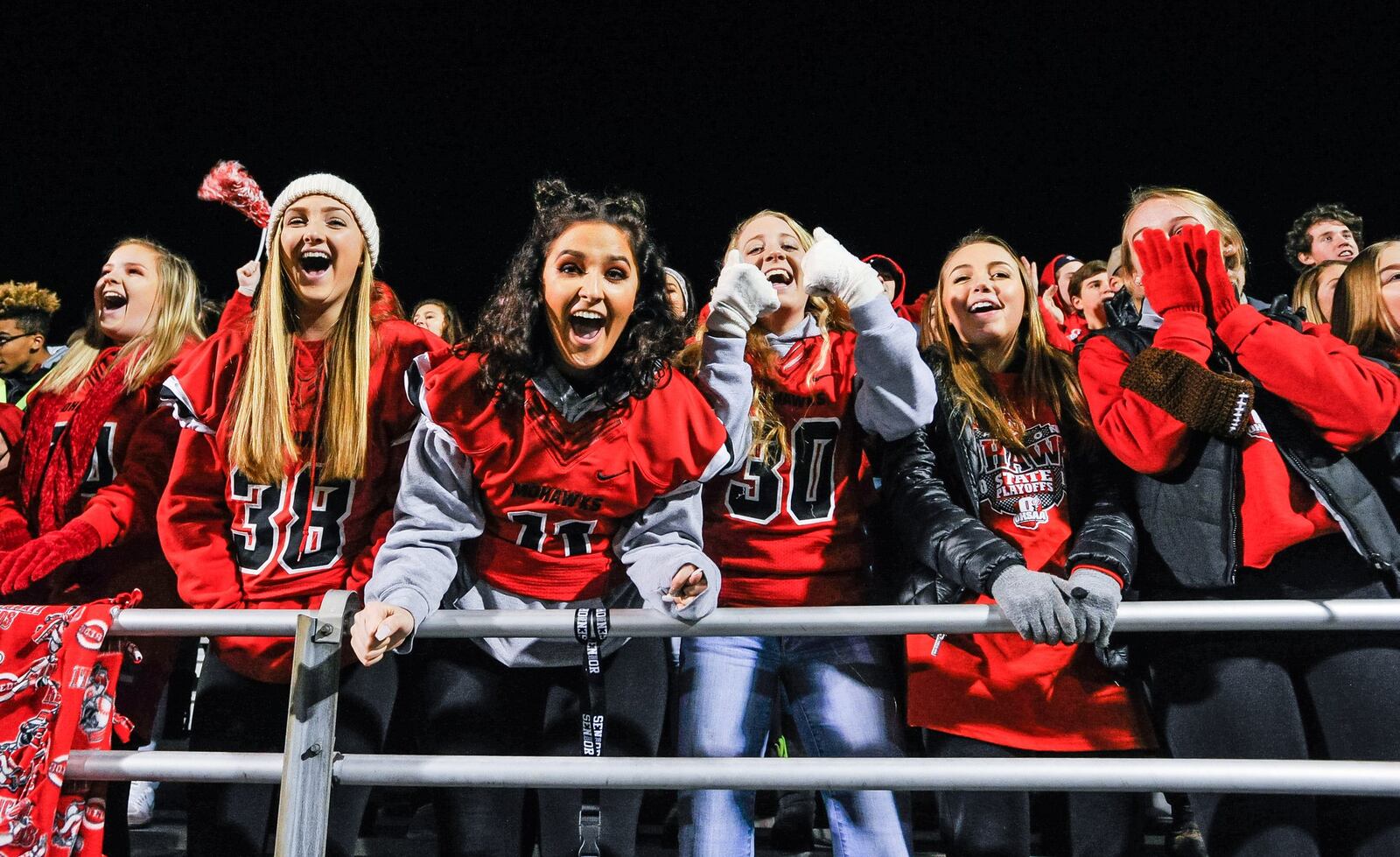 Madison fans show their excitement during Friday night’s 42-7 win over West Jefferson in the Division V, Regionl 20 final at Beavercreek. NICK GRAHAM/STAFF
