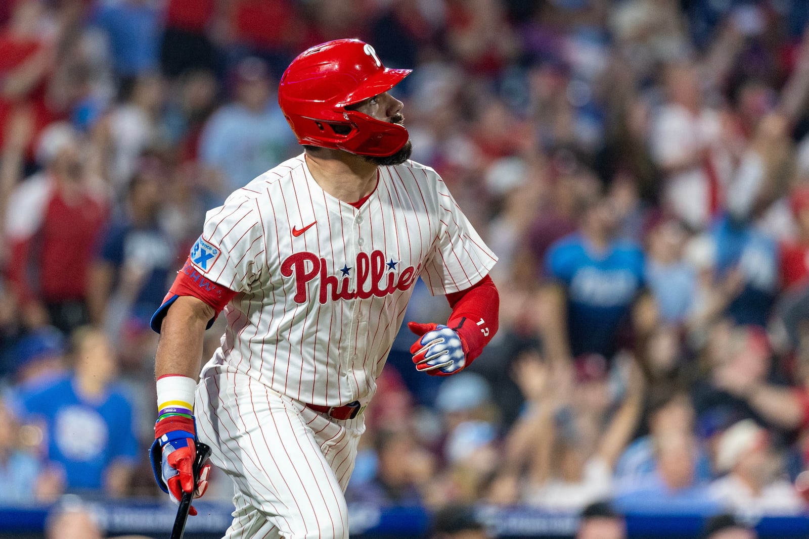Philadelphia Phillies designated hitter Kyle Schwarber watches his ball after hitting a solo home run in the third inning of a baseball game against the Miami Marlins, Wednesday, Sept. 24, 2025, in Philadelphia. (AP Photo/Laurence Kesterson)