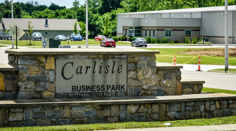 Carlisle Village Council Tuesday considered the continuation of its medical marijuana moratorium for another six months. The emergency legislation does allow for one 10-acre parcel in the Carlisle Business Park to be excluded from the moratorium as the village has a pending land sale to a medical marijuana interest. Although Ohio Craft Cultivators LLC did not receive a large growers license from the state, it had expressed an interest in developing a processing facility. Those licenses have not yet been awarded by the state. ED RICHTER/STAFF