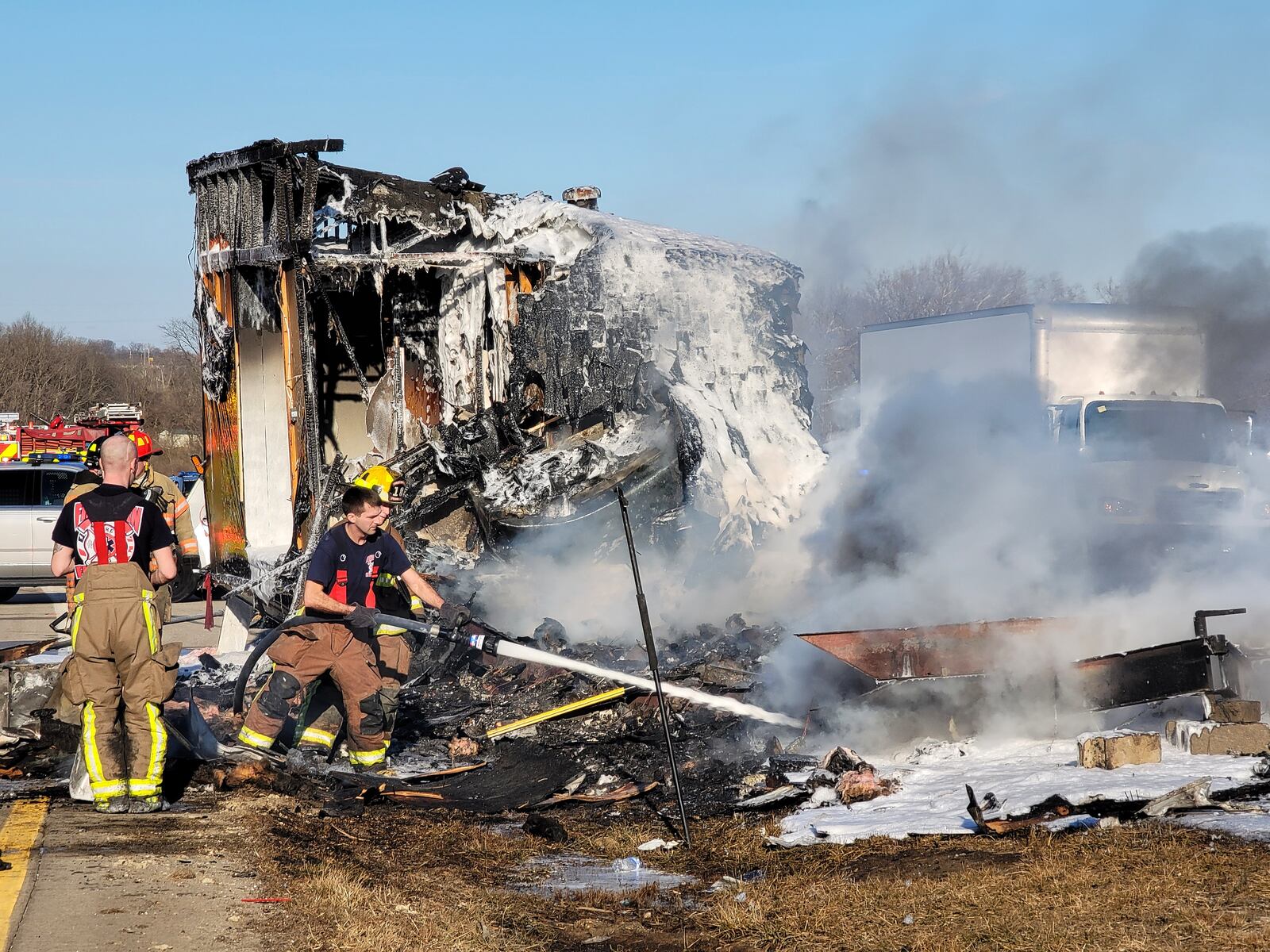 Traffic on I-75 southbound was down to one lane at the OH-123 exit from a mobile home that caught fire while being towed this afternoon. NICK GRAHAM / STAFF