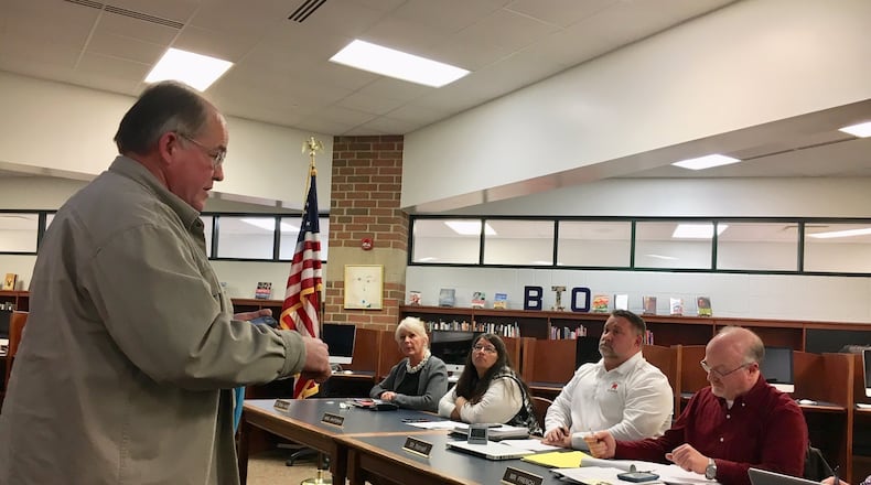 Madison Schools resident Bill Ison, who is also a plaintiff in a lawsuit against the district’s school board claiming members are restricting free speech at public meetings, criticizes the board during Tuesday’s meeting. Ison has been a lead critic of Madison’s program of arming some school staffers as part of the district’s security plan.