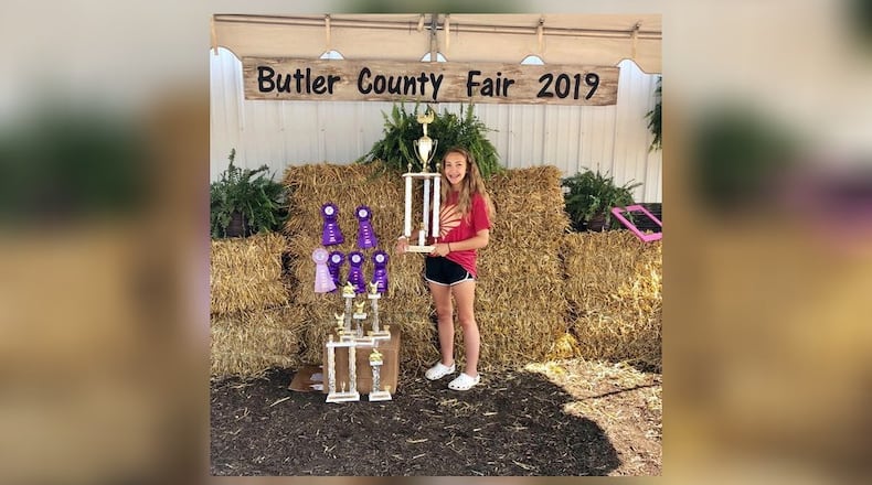 Talawanda High School junior Kennedi Mondello was one of the top livestock winners at last year’s Butler County Fair. Mondello, 15, said the initial news the annual fair had been cancelled by state officials’ orders - due to the coronavirus - was “horrible.” But Mondello said she’s happy with the more recent news about the fair conducting modified livestock showings for children and teens.(Provided Photo/Journal-News)