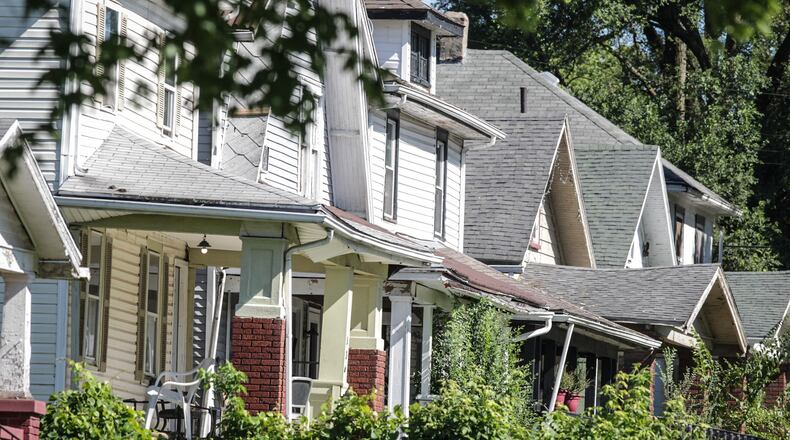 Property values in Dayton and Montgomery County are going up including these homes on Huron Ave. in Dayton.JIM NOELKER/STAFF