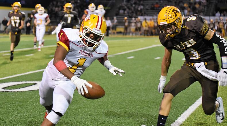 Fenwick’s Jordan Rucker (1) is pursued by Alter’s Derek Willits (9) on Friday night at Centerville Stadium in a game won by Alter 45-20. CONTRIBUTED PHOTO BY ANGIE MOHRHAUS