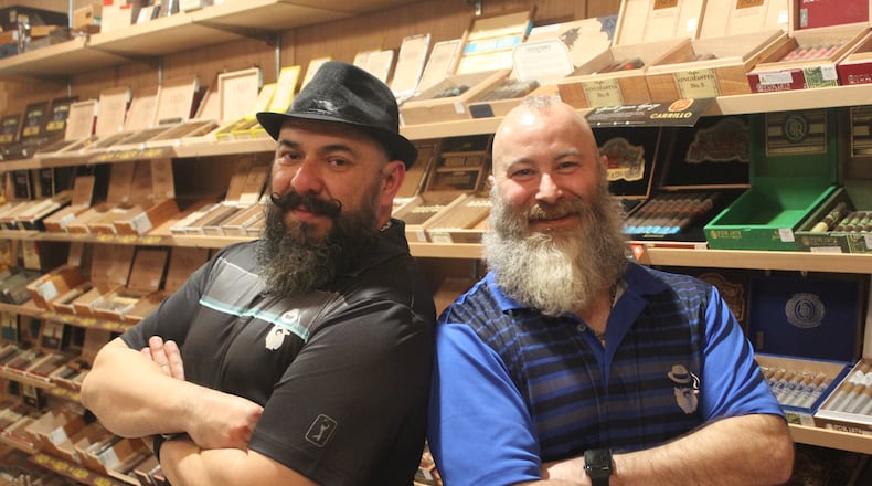 Gonzo Gonzales (right) and his husband Bryan Emerson (left) celebrated the grand opening of B&G's Cigar Lounge on Feb. 7, 2020. It was Super Bowl weekend.