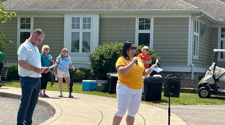 Pam Cottle, interim president and CEO of the Butler County United Way, addresses the 104 golfers who played Monday afternoon in the Golf United Classic at Shaker Run Golf Club. RICK McCRABB/STAFF