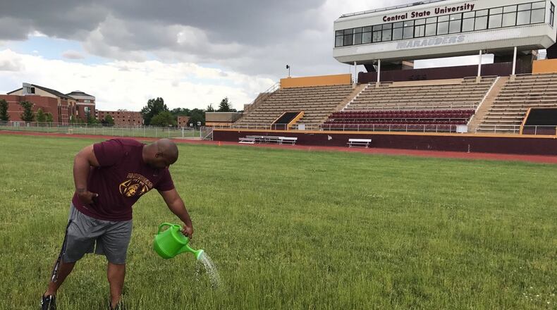 New Central State University football coach Bobby Rome works on the field at McPherson Stadium this week. Tom Archdeacon/CONTRIBUTED