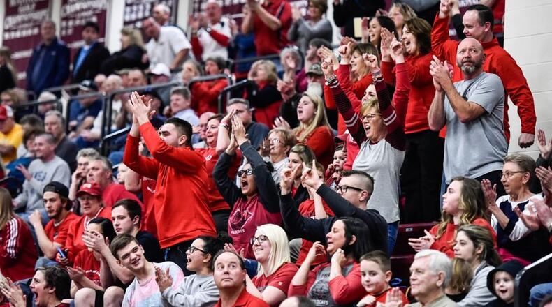 Franklin fans cheer on their team during the Wildcats’ Division II sectional-final victory over Monroe on Feb. 26 at Lebanon. NICK GRAHAM/STAFF