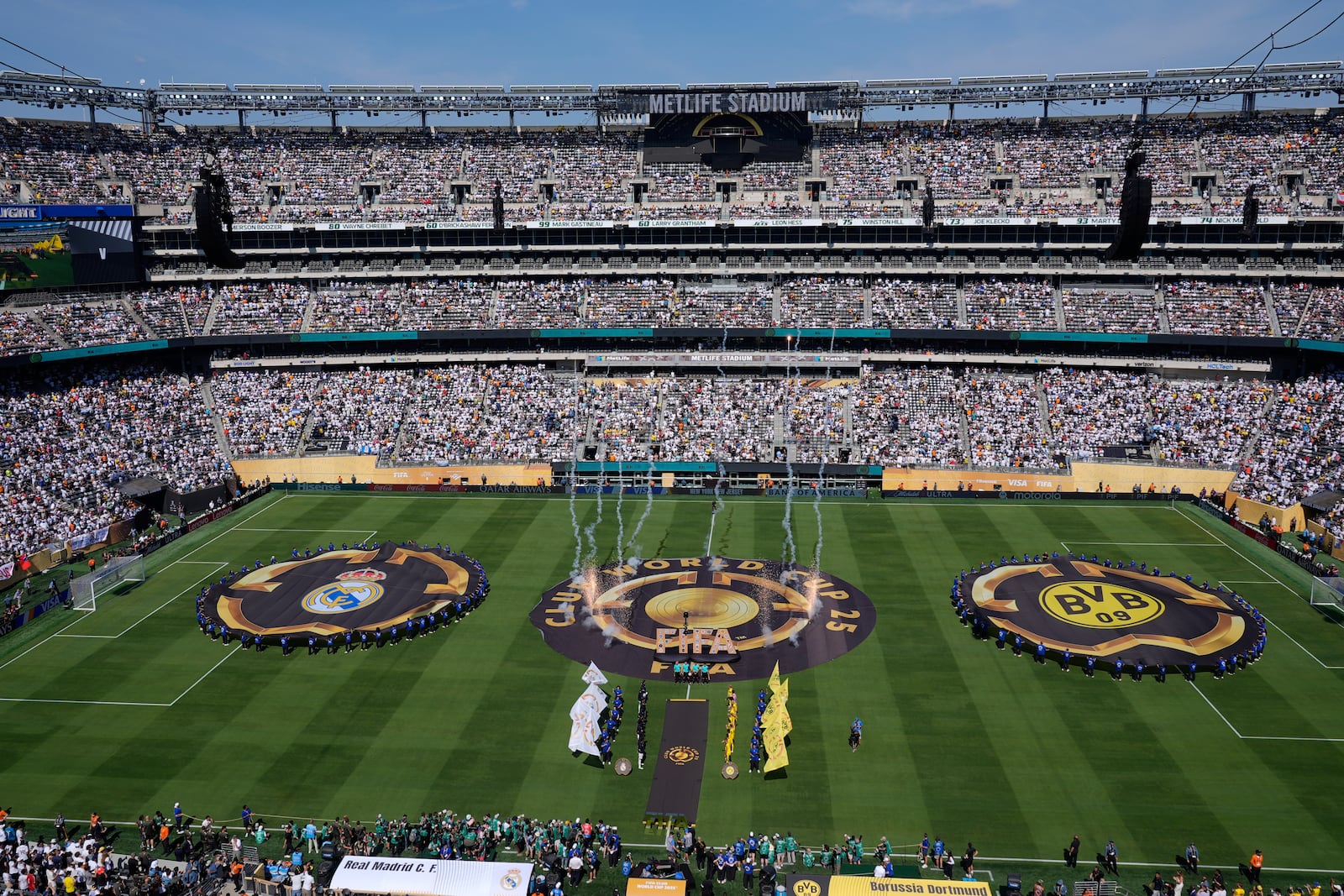 Players line up prior to the Club World Cup quarterfinal soccer match between Real Madrid and Borussia Dortmund in East Rutherford, N.J., Saturday, July 5, 2025. (AP Photo/Pamela Smith)