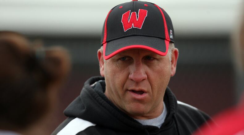Coach Keith Castner of the Lakota West varsity softball team, runs practice at the school, Friday, Mar. 25, 2011. Staff photo by Greg Lynch