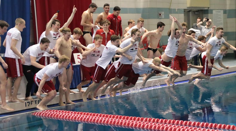 The Miami University men’s swimming team celebrates its first Mid-American Conference championship in 13 years. PHOTO COURTESY OF MIAMI ATHLETICS