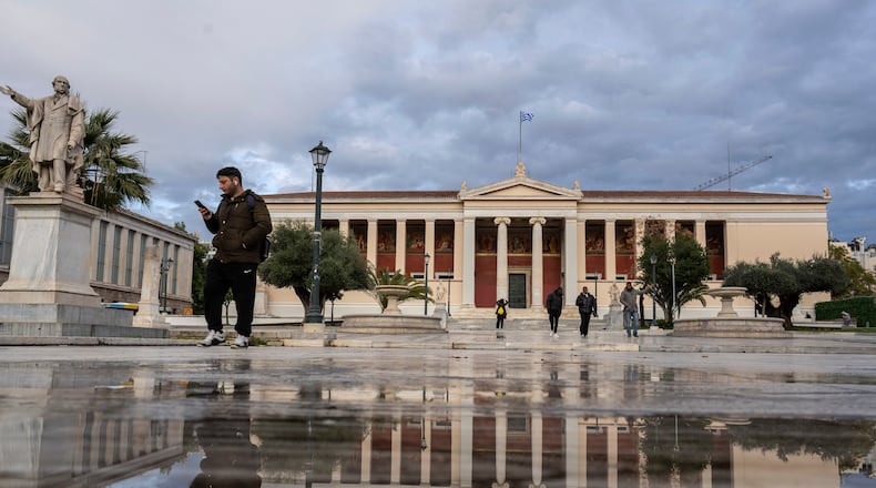 FILE - The headquarters of Athens University stands after a rainfall in Athens, on Monday, Jan. 13, 2025. (AP Photo/Petros Giannakouris, File)