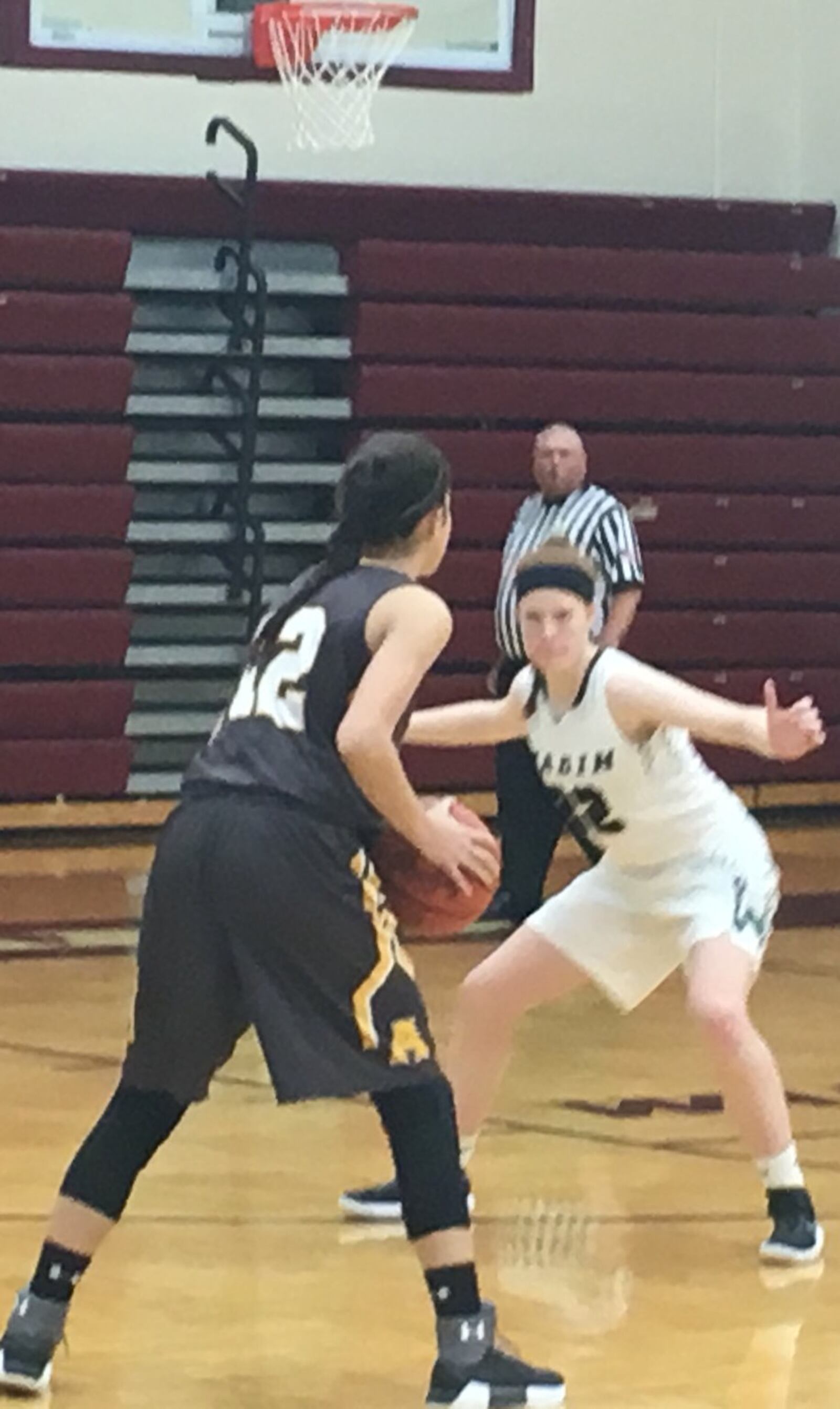 Badin’s Mickayla Kowalski (32) guards Alter’s Julia Paley (12) during Thursday night’s Division II sectional game at Lebanon. RICK CASSANO/STAFF