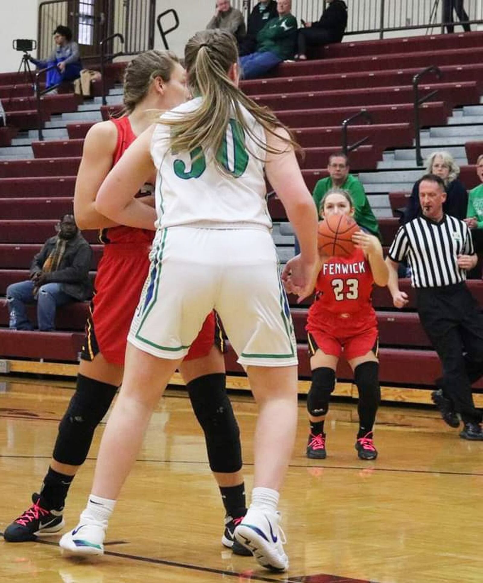 Fenwick’s Brooke Brunner (23) prepares to launch a 3-pointer during Saturday afternoon’s Division II sectional opener against Chaminade Julienne at Lebanon. Fenwick won 38-35. CONTRIBUTED PHOTO BY TERRI ADAMS