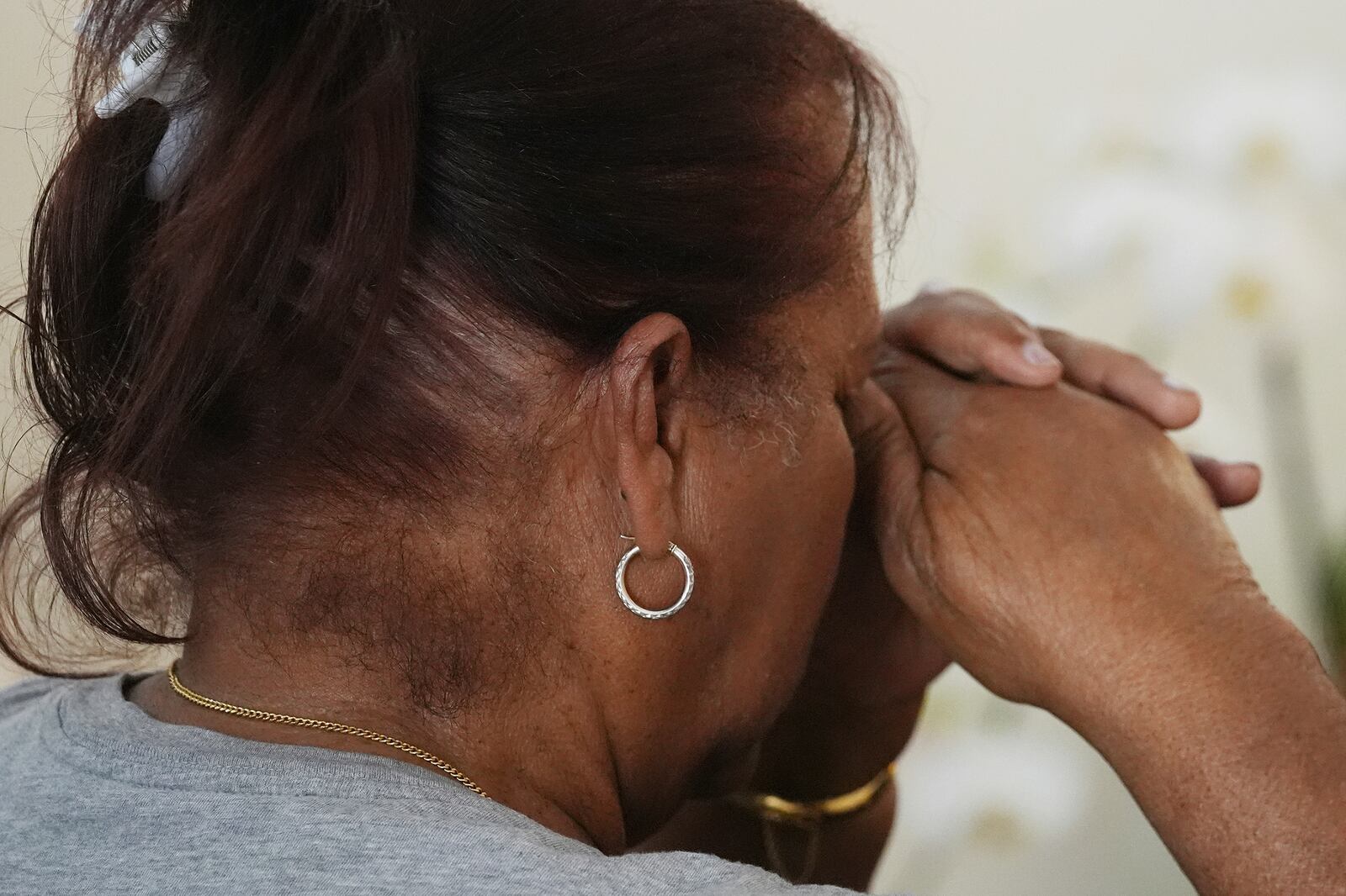 A parishioner prays in the perpetual adoration chapel at St. Benedict Catholic Church in Hialeah, Fla., on Thursday, March 20, 2025. (AP Photo/Marta Lavandier)