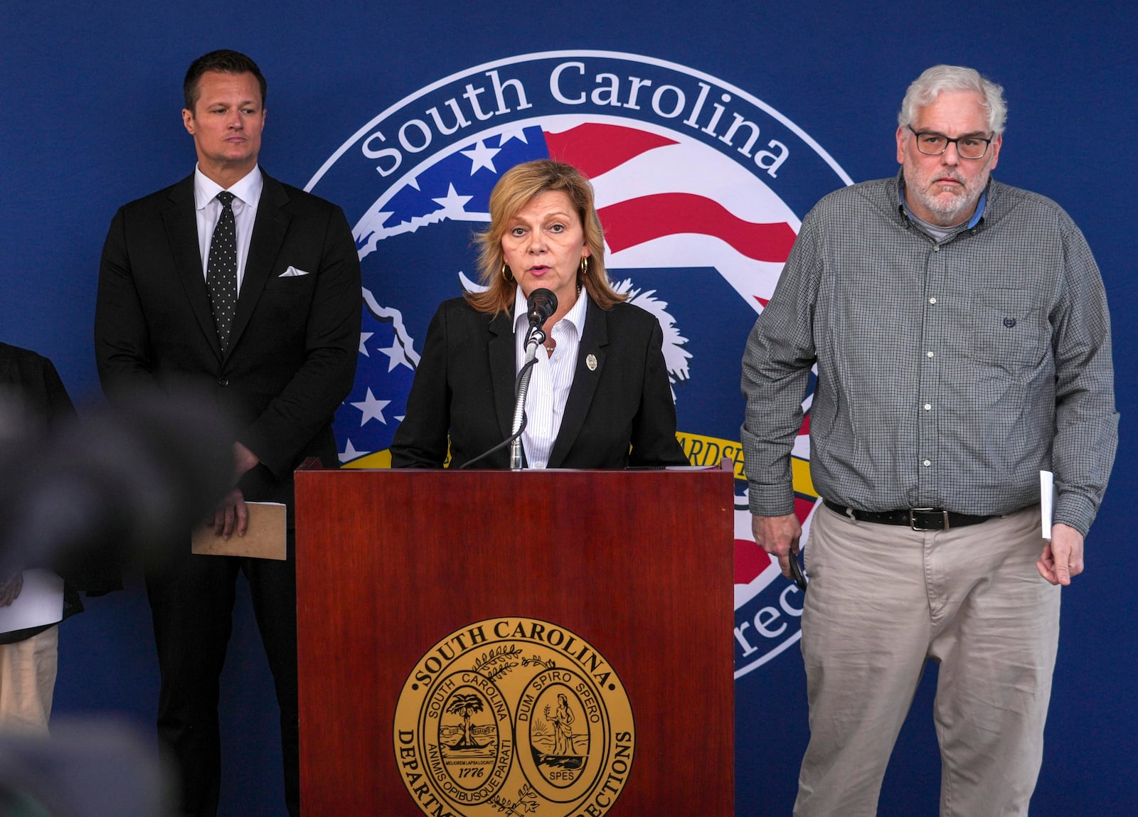 Director of Communications at the South Carolina Department of Corrections Chrysti Shain (center), speaks during a press conference after the execution of South Carolina inmate Mikal Mahdi in Columbia, S.C., Friday, April 11, 2025. (AP Photo/David Yeazell)