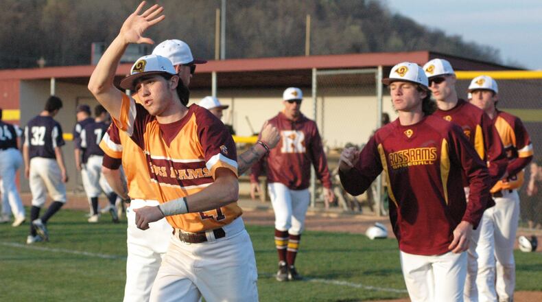 Zach Ungermann of Ross goes through the postgame handshake Wednesday after the Rams defeated visiting Edgewood 13-9 in Southwest Ohio Conference baseball action in Ross Township. RICK CASSANO/STAFF