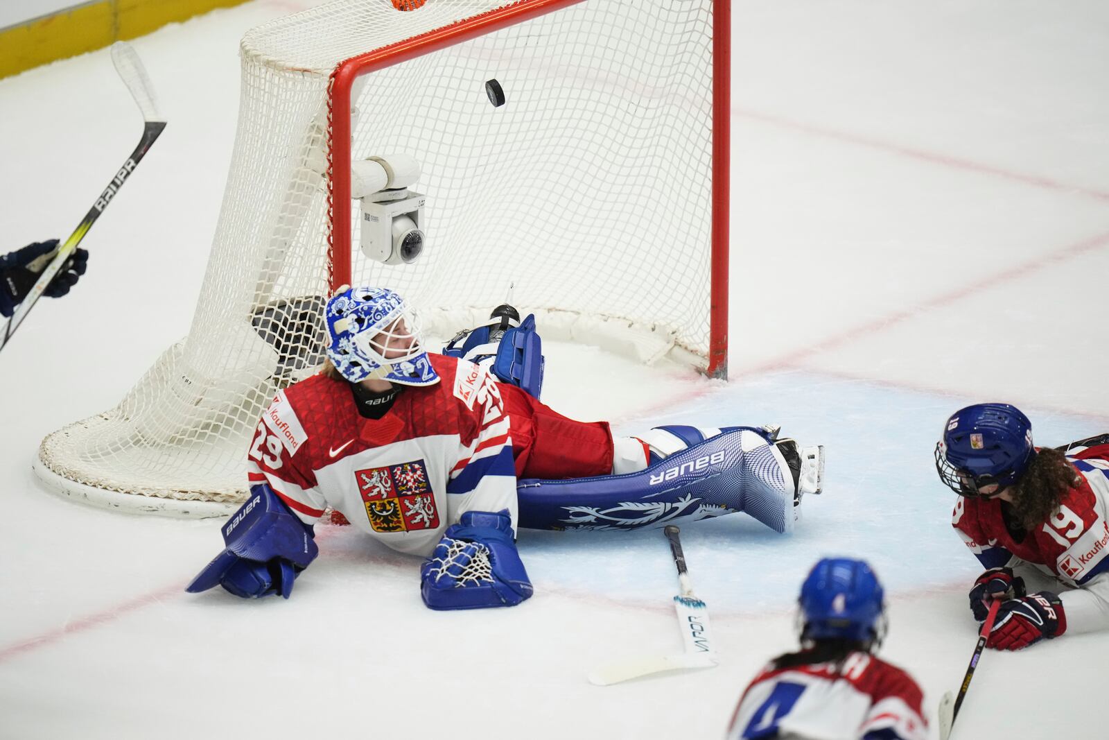 Klara Peslarova of Czech Republic fails to make a save during the bronze medal match between Czech Republic and Finland at the Women's Ice Hockey Championships in Ceske Budejovice, Czech Republic, Sunday, April 20, 2025. (AP Photo/Petr David Josek)