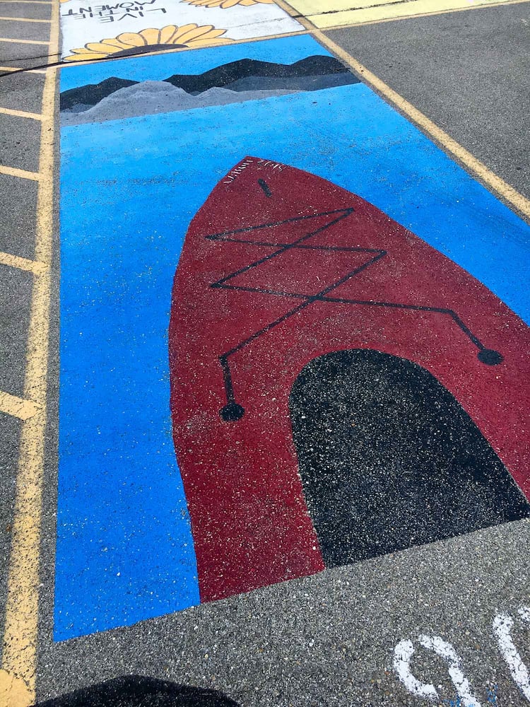 PHOTOS Lakota East seniors paint parking spots