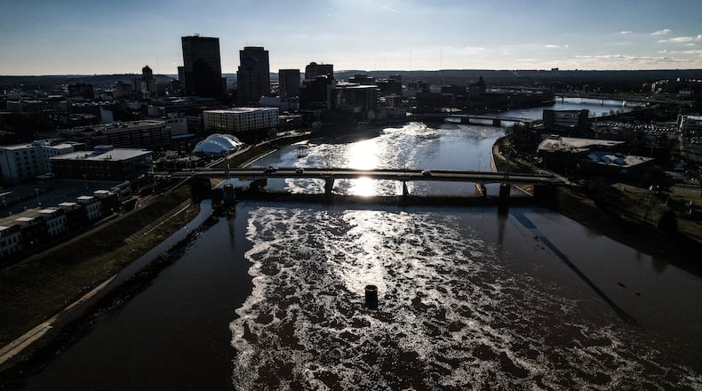 The Great Miami River flows west and south around downtown Dayton, past RiverScape MetroPark. JIM NOELKER/STAFF