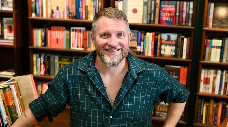 Bobby Minelli, owner of Household Books, opened his second location in downtown Hamilton, filling a void in the city. It's now the only independent bookstore in the city, and one of only a a couple independent or used bookstores in Butler County. MICHAEL D. PITMAN/STAFF